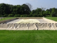 fuel bladder containment system set up on grass