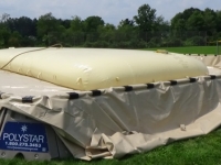 bladder being contained on bladder dike mpe