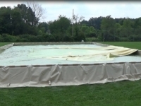 unfilled fuel bladder on poly dike spill containment system